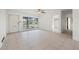 Spacious living area with tile floors and access to hallway at 450 Capri Isles Ct, Punta Gorda, FL 33950