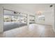 Living area showcasing tile floors and pool view at 450 Capri Isles Ct, Punta Gorda, FL 33950