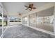 Spacious covered patio overlooking a refreshing pool at 450 Capri Isles Ct, Punta Gorda, FL 33950