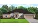 One-story home with a two-car garage and landscaped lawn at 5527 Brussels Ter, Port Charlotte, FL 33981