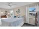 Main bedroom with a queen-size bed and backyard view at 745 Kellstadt Nw St, Port Charlotte, FL 33952
