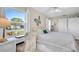 Bedroom with a queen-size bed and backyard view at 745 Kellstadt Nw St, Port Charlotte, FL 33952
