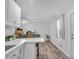 Open kitchen with island and seating area at 745 Kellstadt Nw St, Port Charlotte, FL 33952