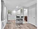 Charming kitchen with breakfast bar and adjacent bathroom at 745 Kellstadt Nw St, Port Charlotte, FL 33952