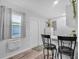Small, well-equipped kitchenette with two bar stools at 745 Kellstadt Nw St, Port Charlotte, FL 33952