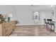 Bright and airy living room with wood-look floors at 745 Kellstadt Nw St, Port Charlotte, FL 33952