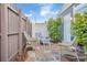Relaxing patio with seating area and privacy fence at 745 Kellstadt Nw St, Port Charlotte, FL 33952