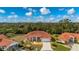 Single Gathering home with tile roof and landscaped yard at 8326 Creekview Ln, Englewood, FL 34224