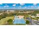 Community features tennis courts, pool, and golf course at 8326 Creekview Ln, Englewood, FL 34224