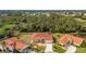 Single Gathering home with tile roof and landscaped yard at 8326 Creekview Ln, Englewood, FL 34224