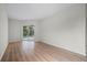Bright bedroom with sliding glass doors leading to the pool area at 8326 Creekview Ln, Englewood, FL 34224