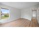 Bedroom with water view and neutral decor at 8326 Creekview Ln, Englewood, FL 34224