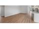 Spacious dining area with hardwood floors and kitchen access at 8326 Creekview Ln, Englewood, FL 34224