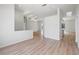 Open concept dining area with hardwood floors at 8326 Creekview Ln, Englewood, FL 34224