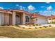 Front view of a single-story house with tile roof and landscaping at 8326 Creekview Ln, Englewood, FL 34224