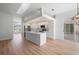 Modern kitchen with island and stainless steel appliances at 8326 Creekview Ln, Englewood, FL 34224
