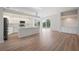 Modern kitchen with island and stainless steel appliances at 8326 Creekview Ln, Englewood, FL 34224