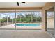 Inviting pool area with screened enclosure at 8326 Creekview Ln, Englewood, FL 34224