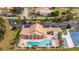 Resort-style community pool with surrounding lounge area at 8326 Creekview Ln, Englewood, FL 34224