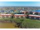 Aerial view of condo complex near the coast with water access at 87 Vivante Blvd # 403, Punta Gorda, FL 33950