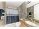 Bathroom with granite vanity and shower at 87 Vivante Blvd # 403, Punta Gorda, FL 33950