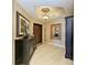 Elegant entryway with dark wood furniture and light flooring at 87 Vivante Blvd # 403, Punta Gorda, FL 33950