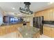 Open kitchen with granite countertops and stainless steel appliances at 87 Vivante Blvd # 403, Punta Gorda, FL 33950