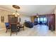 Open living and dining area with hardwood floors and ocean views at 87 Vivante Blvd # 403, Punta Gorda, FL 33950