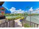 Tennis courts with gated access and lush landscaping at 87 Vivante Blvd # 403, Punta Gorda, FL 33950