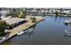 Aerial view showcasing waterfront property and surrounding canals at 951 Santa Brigida Ct, Punta Gorda, FL 33950