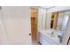 Bathroom with vanity and linen closet at 951 Santa Brigida Ct, Punta Gorda, FL 33950
