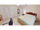 Bedroom with a double bed, workspace and built in closet at 951 Santa Brigida Ct, Punta Gorda, FL 33950