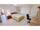 Bedroom with a double bed, workspace, and wooden nightstand at 951 Santa Brigida Ct, Punta Gorda, FL 33950