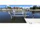Private boat lift providing easy boat access in a desirable location at 951 Santa Brigida Ct, Punta Gorda, FL 33950