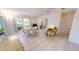 Open concept dining area and kitchen with access to the lanai at 951 Santa Brigida Ct, Punta Gorda, FL 33950