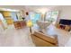 Open concept dining area with kitchen and living room views at 951 Santa Brigida Ct, Punta Gorda, FL 33950