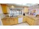 Bright kitchen with granite countertops and water views at 951 Santa Brigida Ct, Punta Gorda, FL 33950