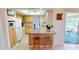 Kitchen with granite countertops and light wood cabinets at 951 Santa Brigida Ct, Punta Gorda, FL 33950