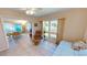 Sunroom features water views and access to a dining area at 951 Santa Brigida Ct, Punta Gorda, FL 33950