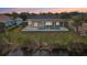 Backyard features pool and canal view at 9516 President Cir, Port Charlotte, FL 33981