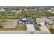 Aerial view of two houses near the water, showcasing waterfront property at 9516 President Cir, Port Charlotte, FL 33981