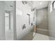Spa-like bathroom with double shower heads and built-in bench at 9516 President Cir, Port Charlotte, FL 33981