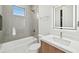 Bathroom with soaking tub, vanity and LED mirror at 9516 President Cir, Port Charlotte, FL 33981