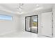 Bright bedroom with access to a private patio at 9516 President Cir, Port Charlotte, FL 33981