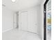 Spacious bedroom with double doors and large closet at 9516 President Cir, Port Charlotte, FL 33981