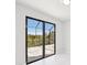 Bright bedroom with sliding doors leading to a patio and water view at 9516 President Cir, Port Charlotte, FL 33981