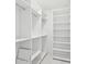 Large walk-in closet with ample shelving and hanging space at 9516 President Cir, Port Charlotte, FL 33981