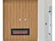 Modern linear fireplace with wood-paneled wall at 9516 President Cir, Port Charlotte, FL 33981