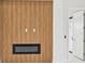 Modern linear fireplace with wood-paneled wall at 9516 President Cir, Port Charlotte, FL 33981