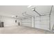 Spacious garage with automatic door opener at 9516 President Cir, Port Charlotte, FL 33981